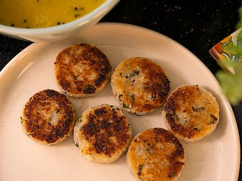 A Bengali savoury - Narkol’er bora or coconut fritters 