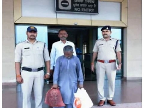 Prahlad (holding carry bags) with was 33-years-old when he went missing from his village. 
