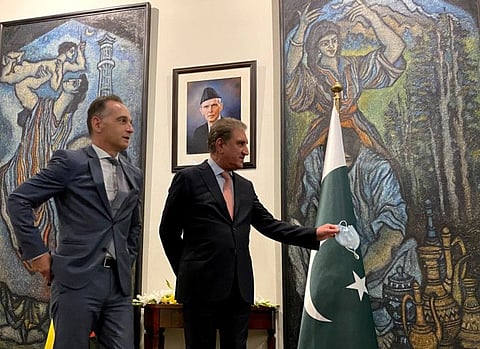 Pakistan's Foreign Minister Shah Mahmood Qureshi meets German Foreign Minister Heiko Maas in Islamabad on August 31, 2021. 