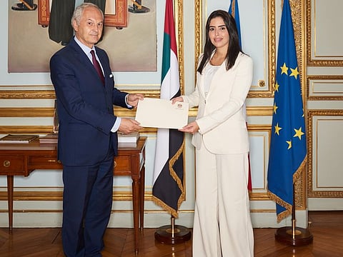 Hind Manea Saeed Al Otaiba presents a copy of her credentials as UAE Ambassador to France, to Philippe Franc, Director of State Protocol and Diplomatic Events, in Paris. 
