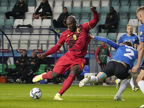 Belgium's Romelu Lukaku scores their third goal.