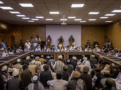Khalil Haqqani, a leader of the Taliban-affiliated Haqqani network, center, leads a gathering of tribal elders in Kabul, Afghanistan on Aug. 26, 2021. 