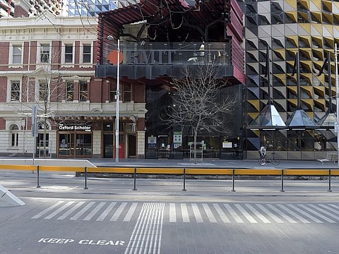 An empty street outside the Royal Melbourne Institute of Technology (RMIT) University city campus in Melbourne, Australia, on Wednesday, Sept. 8, 2021.