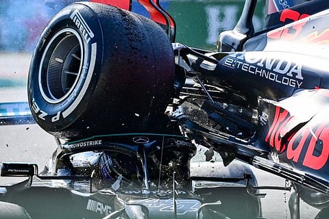 Lucky to be alive... Mercedes' British driver Lewis Hamilton could have been killed when Red Bull's Dutch driver Max Verstappen's car collided with his and landed on top of him during the Italian Formula One Grand Prix at the Autodromo Nazionale circuit in Monza.