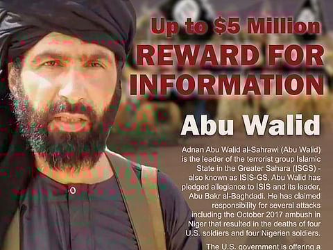 This undated image provided by Rewards For Justice shows a wanted posted of Adnan Abu Walid al-Sahrawi, the leader of Daesh in the Greater Sahara.