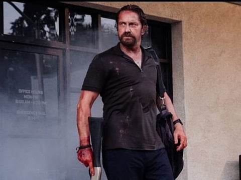 Film review: ‘Copshop’ is a cat-and-mouse movie with plenty of brute force