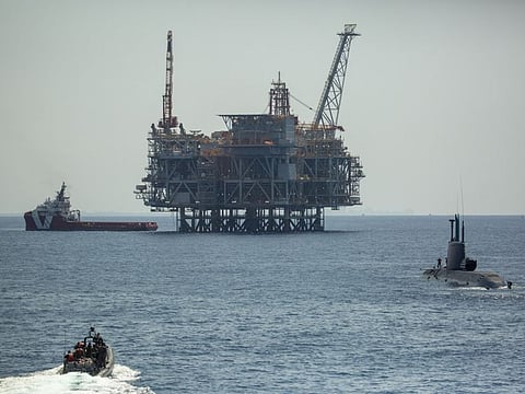 An oil platform in Israel's offshore Leviathan gas field is seen from on board the Israeli Navy Ship Atzmaut as a submarine patrols, in the Mediterranean Sea.