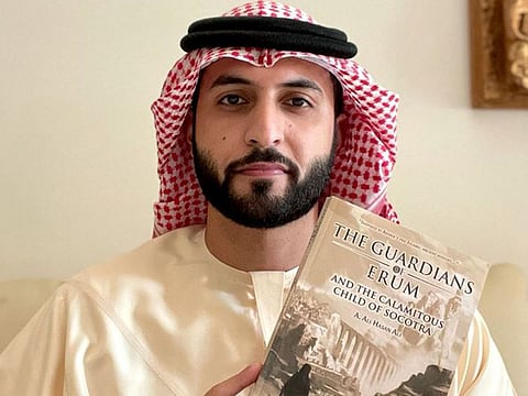 Author Ali Al Hosani with his maiden literary offering -- the novel 'The Guardians of Erum and the Children of Socotra'. 