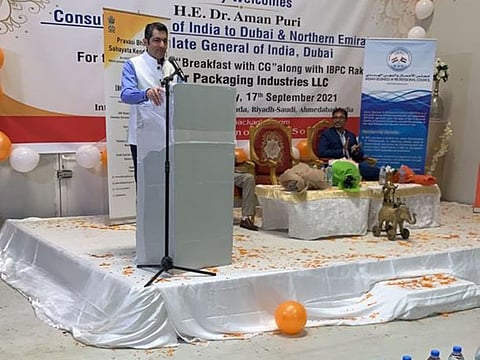 Dr Aman Puri, Indian Consul-General in Dubai, addresses Indian workers in Ras Al Khaimah on Friday.  