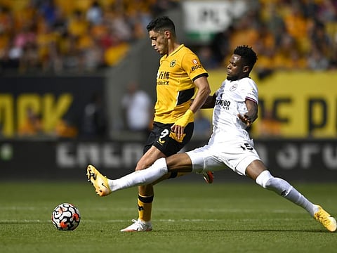 Wolverhampton Wanderers' Raul Jimenez in action with Brentford's Frank Onyeka.