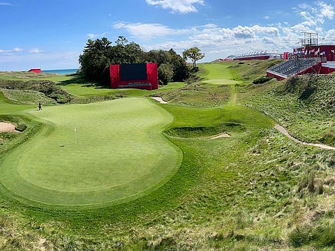 Temporary grandstands are set up around the 18th hole at Whistling Straits Golf Course in preparation for the Ryder Cup 