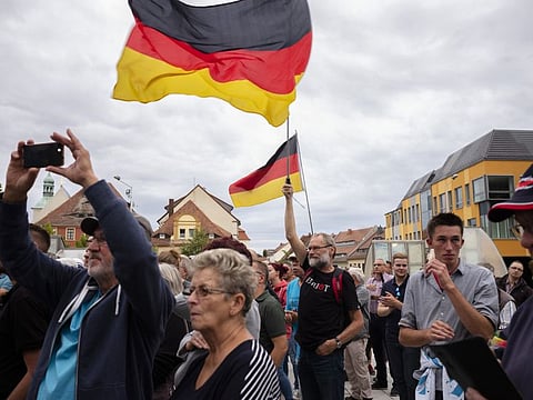 A crowd attends an election rally of German Alternative for Germany, AfD, party for the Saxony state elections in Bautzen, Germany. Migration is a side issue in this year's German election campaign for the national elections on September 26, but that hasn't stopped the country's biggest far-right party from trying to play it up. 