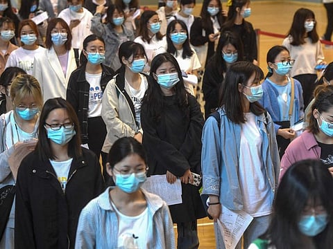 University students queue to receive vaccine in Wuhan in central Hubei province. China has fully vaccinated over 1 billion people -- 70 per cent of its 1.4 billion population -- a health official said on September 16.