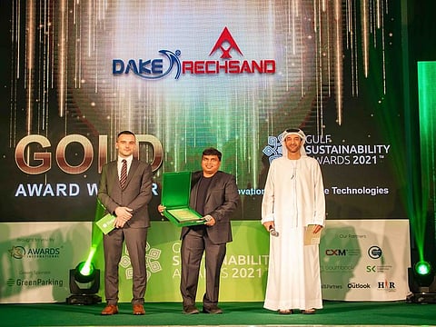 Chandra Dake, CEO Dake Rechsand receiving the Gold in Gulf Sustainability Award 2021 - Innovation in Sustainable Technologies