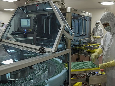 Quality checking during the manufacture of the Covishield vaccine at the Serum Institute in Pune, India.
