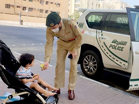Lt Omar Al Zaabi, an officer at Al Muraqqabat Police Station, told Gulf News that he was on duty on September 26 this year, when he noticed a Filipina boy waving at the police patrol. He stopped the car and stepped out to greet the boy who was surprised.