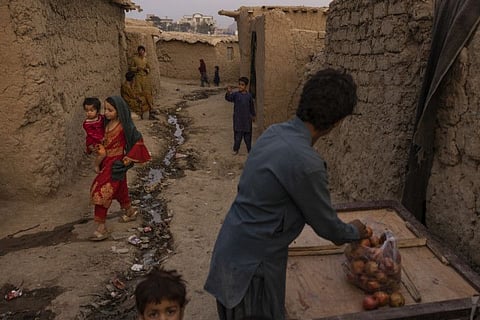 Children in the Charahi Qambar refugee camp in Kabul on September 29, 2021. The health care system in Afghanistan is on the brink of collapse, international aid groups warned this week, threatening to deepen the country’s humanitarian crisis just as temperatures begin dropping. 