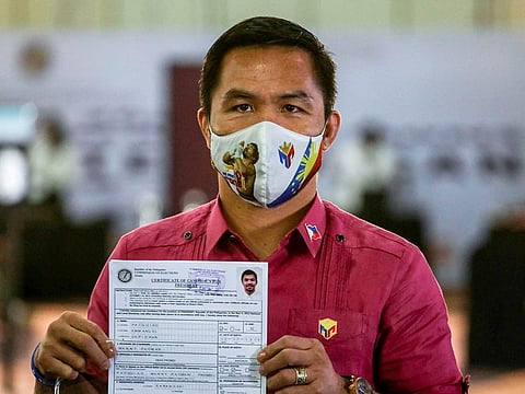 Philippine senator and newly retired boxing icon Manny Pacquiao files his certificate of candidacy to join the presidential race, at Sofitel Harbor Garden Tent, in Pasay City, Metro Manila, on October 1, 2021. 
