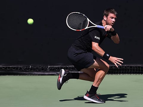 Cameron Norrie of Great Britain plays a forehand shot against Andrey Rublev of Russia in the San Diego Open semi final. Norrie won 3-6 6-3 6-4 to book his place in the final. 