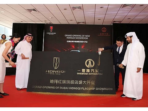Jojo Zhang, Deputy Chief of Oneroad Group, Yaqoob Al Ali, Elvin Xie, General Manager of Oneroad Automotive Trading and Ahmad Bin Eisa Alserkal at the launch of the showroom