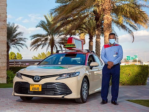 The drivers were awarded the 'Medal of Trust' by the RTA for returning riders' belongings