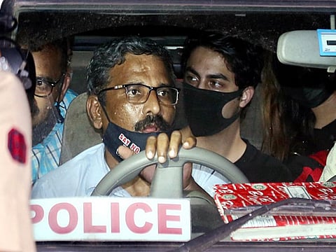 Aryan Khan in a police van after his court session in Mumbai earlier this week