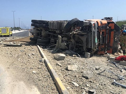 The truck after it flipped over on Yabsa Road in the Sukmkum area of Fjairah.  