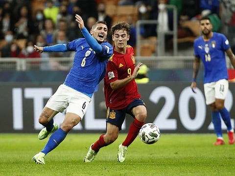 Italy's Marco Verratti in action with Spain's Gavi.