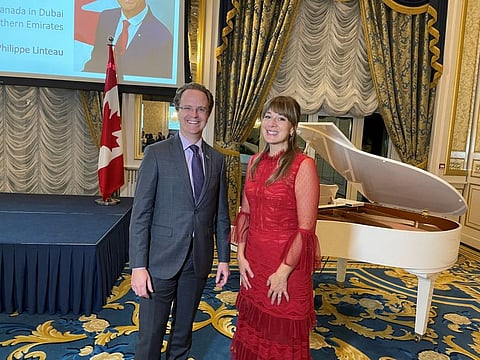 Famous Canadian singer-songwriter Jill Barber posing with Jean-Philippe Linteau, Consul General of Canada in Dubai and the Northern Emirates, at a media interaction event in Dubai on Thursday. 