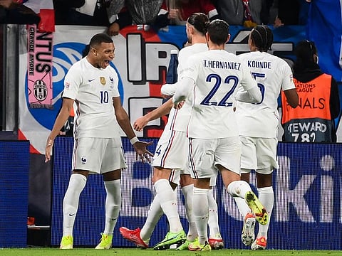 France's Kylian Mbappe celebrates with teammates after scoring against Belgium in the Nations League