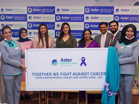 Indian actress Mamta Mohandas who is a cancer survivor, opens a cancer hospital in Dubai on Monday. Alisha Moopen, Managing Director of Aster DM Healthcare also seen along with hospital staff.