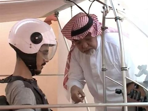 Mohammed Bilal Khoutani with his son. Khoutani did a lot of research on how he could design and build a plane. He read a lot and watched videos on how to construct an aircraft.