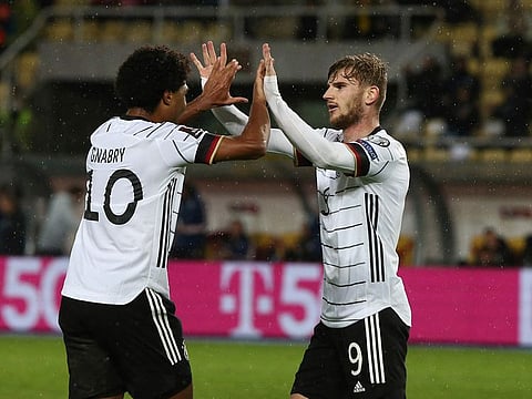 Germany's Timo Werner, right, reacts after scoring his side's second goal.