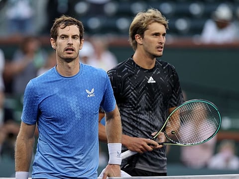 Andy Murray of Great Britain walks away after shaking hands at the net after his straight sets defeat against Alexander Zverev of Germany during their third round match on Day 9 of the BNP Paribas Open at the Indian Wells Tennis Garden in Indian Wells, California.
