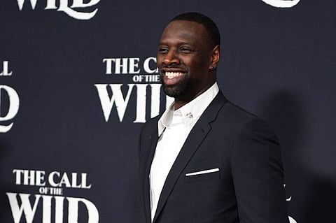 In this file photo taken on February 13, 2020 French actor Omar Sy arrives for Disney's "The Call of the Wild" premiere at El Capitan theatre in Hollywood, California.