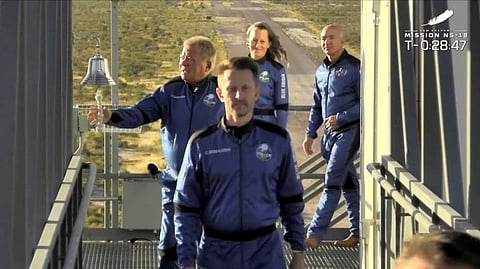 "Star Trek" actor William Shatner rings a bell before boarding Blue Origin's New Shepard rocket on  mission NS-18 for a suborbital flight near Van Horn, Texas, US in a still image from video October 13, 2021. 