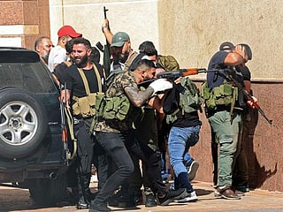 Photos: Deadly chaos erupts during Beirut rally against port blast judge