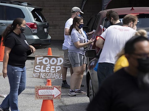 Pro-labour slogans are painted on union members' cars during a rally at the Motion Picture Editors Guild IATSE Local 700 on Sunday, Sept. 26, 2021 in Los Angeles.