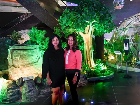 Neha Gandhi (left) and Shubhi Biju left their plush corporate jobs to begin a sustainable landscaping company. Their work on the ground floor of India Pavilion is their most prestigious project.  