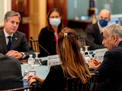 Israeli Foreign Minister Yair Lapid, right, accompanied by Secretary of State Antony Blinken, left, at bilateral meeting at the State Department in Washington, on October 13, 2021. 