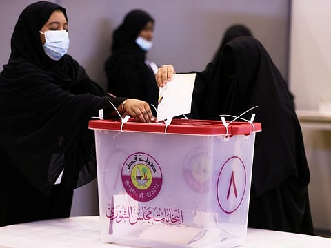 Qatari voters cast ballots in state's first legislative elections for two-thirds of the advisory Shura Council, in Doha on October 2, 2021. 