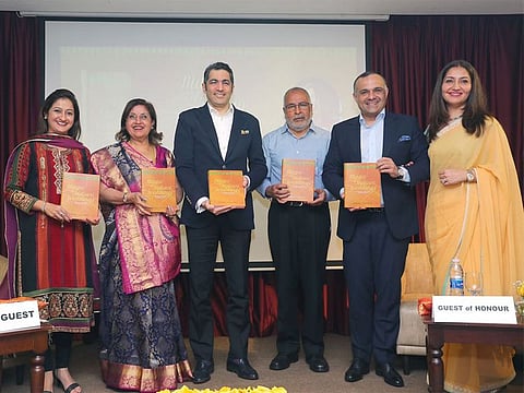 Consul General of India in Dubai Dr Aman Puri (third from left) released the book titled Magic of Indian Weddings: Timeless Traditions, Sacred Customs, authored by former civil servant from India Dr Kiran Chadha (second from left).
