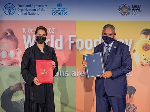 (L to R) Mariam Almheiri, Minister of Climate Change and Environment, and Abdul Hakim Elwaer, FAO’s Assistant Director-General and Regional Representative for the Near East and North Africa, at the agreement signing at Expo 2020 Dubai on Saturday.