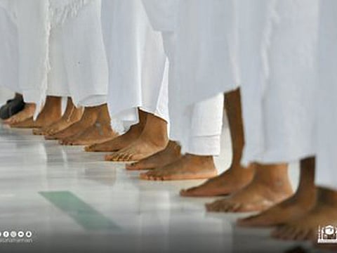 Worshippers pray without distancing in-between at the Grand Mosque on Sunday as anti-coronavirus curbs ease. 