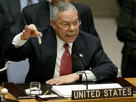  US Secretary of State Colin Powell holds up a vial that he described as one that could contain anthrax, during his presentation on [Iraq] to the UN Security Council, in New York February 5, 2003. [Powell tried to persuade a sceptical world that Iraq is concealing it’s weapons of mass destruction and that force may be necessary to disarm it.] 
