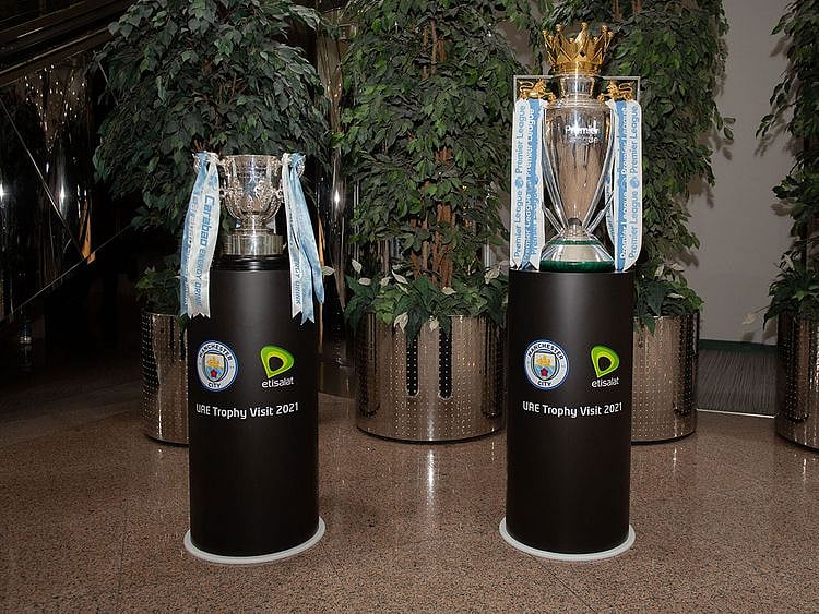 The Premier Leaguer and League Cup trophies are visiting Expo 2020