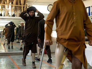 Photos: In Kabul clinic, Taliban and the soldiers they fought confront wounds of war 