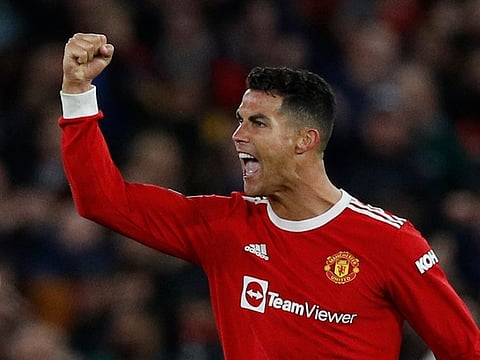 Manchester United's Cristiano Ronaldo celebrates scoring their third goal.