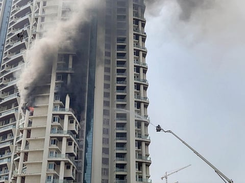 Massive fire broke out at a multi-story residential building near the Lalbaug area in Parel, Mumbai, on October 22, 2021. 
