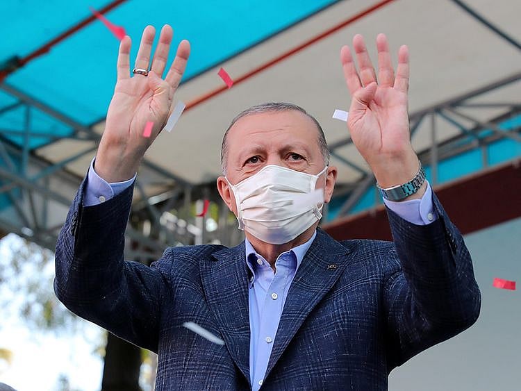 Some analysts said Turkish Foreign Minister Mevlut Cavusoglu and a few other cabinet members were still trying to talk Erdogan (above) out of following through on his declaration and to change his mind.